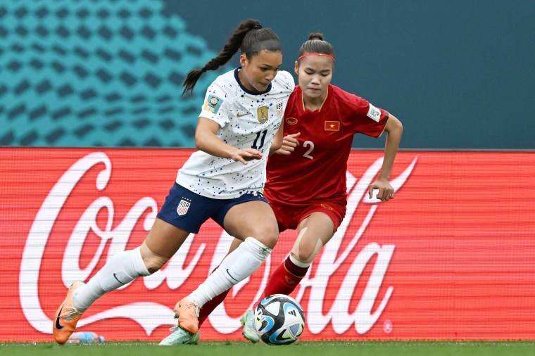 USA's forward #11 Sophia Smith fights for the ball with Vietnam's defender #02 Thi Thu Thuong Luong during the Australia and New Zealand 2023 Women's World Cup Group E football match between the United States and Vietnam at Eden Park in Auckland on July 22, 2023.
