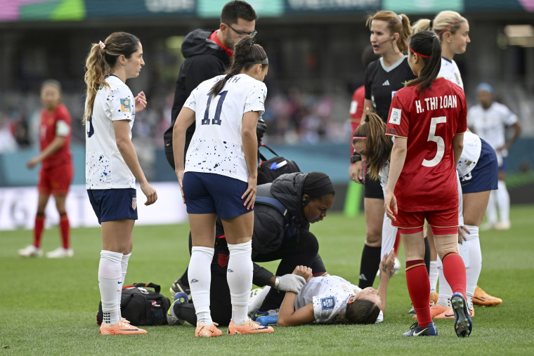 United States' Trinity Rodman grimaces in pain after being injured during the Women's World Cup Group E soccer match between the United States and Vietnam at Eden Park in Auckland, New Zealand, on July 22, 2023.
