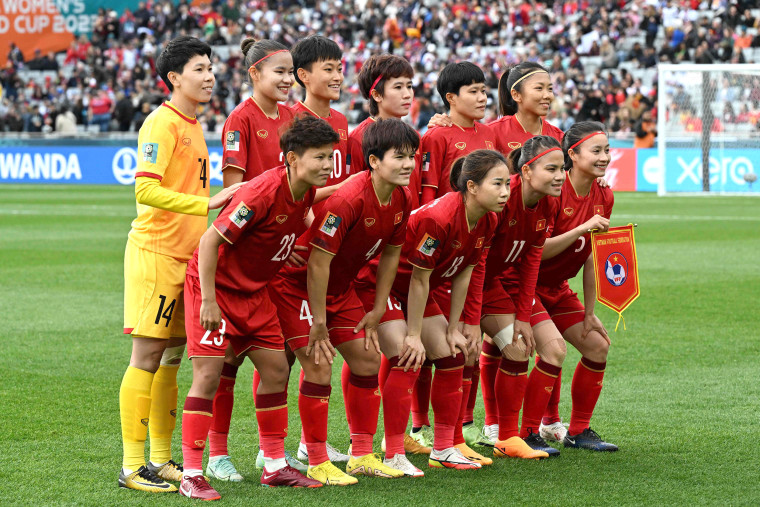 Vietnam's players pose for a group photo before the Australia and New Zealand 2023 Women's World Cup Group E football match between the United States and Vietnam at Eden Park in Auckland on July 22, 2023.