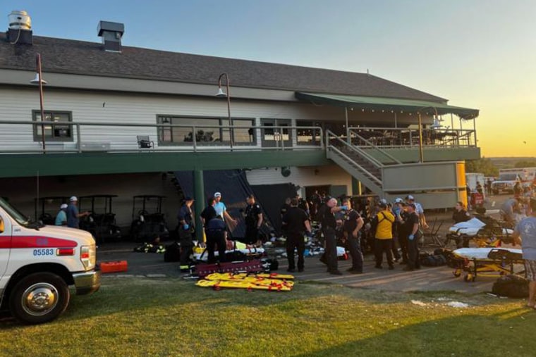 Responders at the scene of a deck collapse in Billings, Mont., on Saturday.