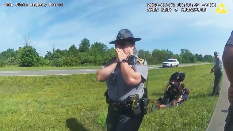 Jadarrius Rose is handcuffed after the dog was pulled away. 