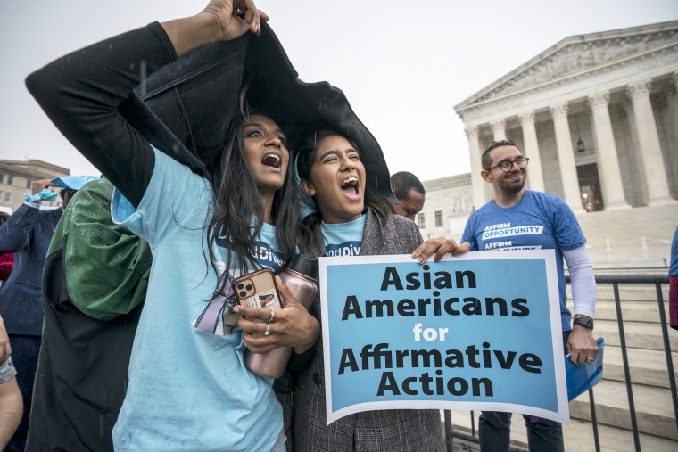 FILE - Harvard students Shruthi Kumar, left, and Muskaan Arshad, join a rally with other activists as the Supreme Court hears oral arguments that could decide the future of affirmative action in college admissions, in Washington, Oct. 31, 2022. Days after the Supreme Court outlawed affirmative action in college admissions on June 29, 2023, activists say they will sue Harvard over its use of legacy preferences for children of alumni. (AP Photo/J. Scott Applewhite, File)