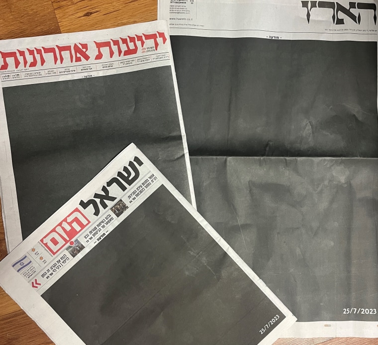 The covers of Israeli newspapers Haaretz, Yedioth Ahronot and Israel Hayom on Tuesday, July 25, 2023. 