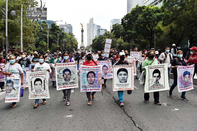 Relatives of the missing students march in Mexico City in 2022, to demand justice for the 43 students who disappeared in Iguala, Guerrero state in 2014. 