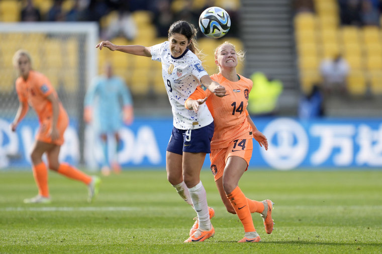 United States' Savannah DeMelo, left, and Netherlands' Jackie Groenen battle for possession during the first half of the FIFA Women's World Cup Group E soccer match between the United States and the Netherlands in Wellington, New Zealand, Thursday, July 27, 2023.