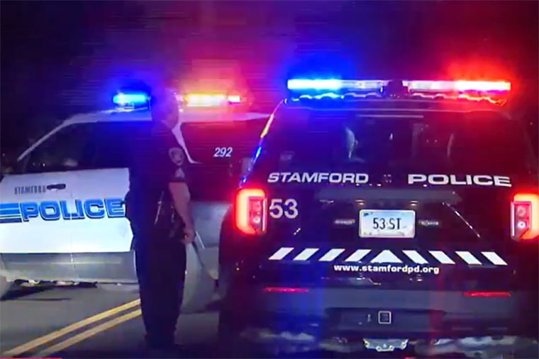 Stamford police investigate the scene of a car accident in Stamford, Conn., on July 26, 2023.