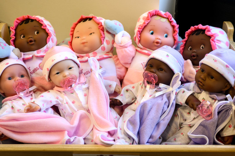  Dolls sit in a crib at LaPetite Academy, an on-site child care center for airport and airline employees at Pittsburgh International Airport, on July 25, 2023 in Moon Township, Pa.