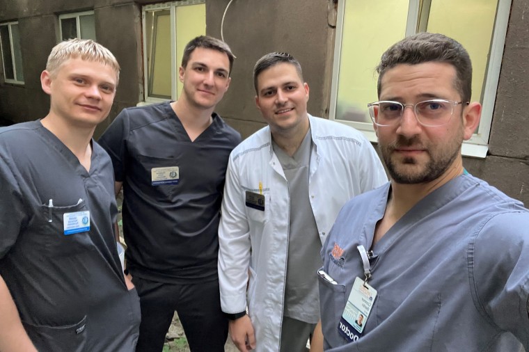 From left, Rostilav Malyi, 28, cranial neurosurgeon, Nikita Lombrozo, 28, neurovascular neurosurgeon, Dmytro Cherevko, 26, spine neurosurgeon, and Conor Berlin, 30.