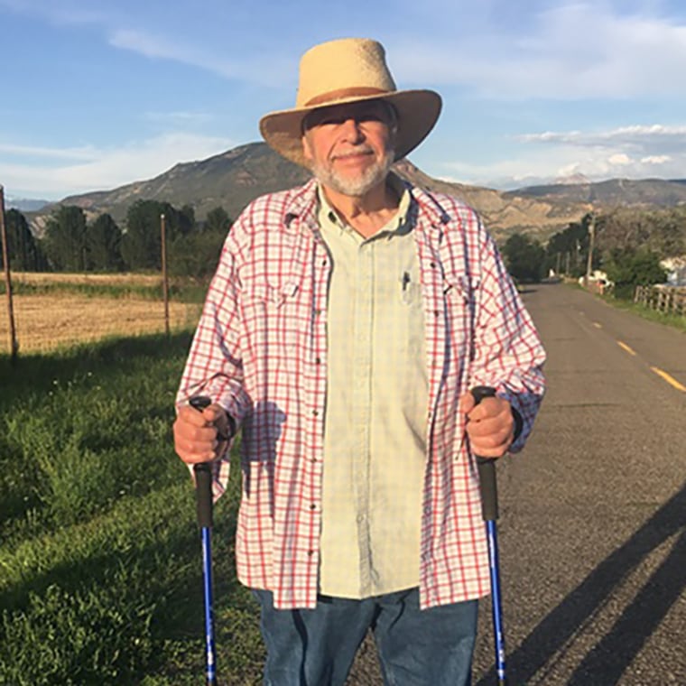 John VanDenBerg on his farm walking in May 2019.