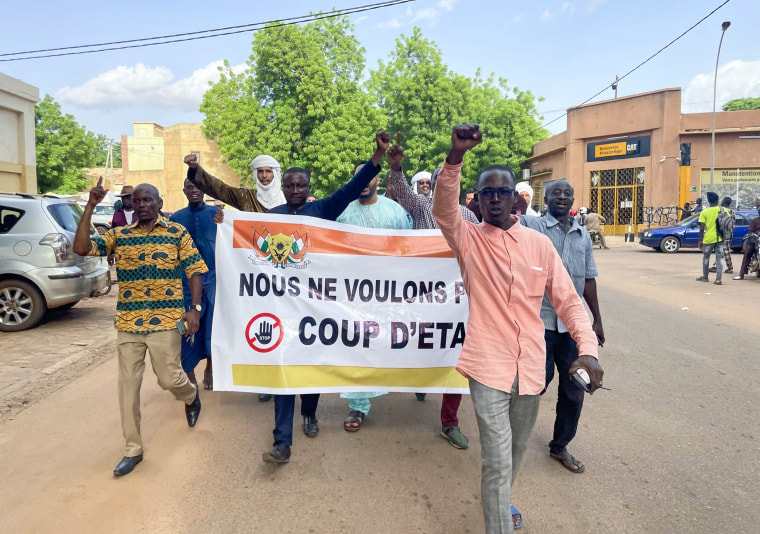 Supporters of Nigerian President Mohamed Bazoum demonstrate in his support in Niamey, Niger on  July 26, 2023.