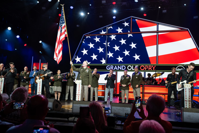 Craig Morgan holds an American flag at the Grand Ole Opry in Nashville on July 29, 2023.