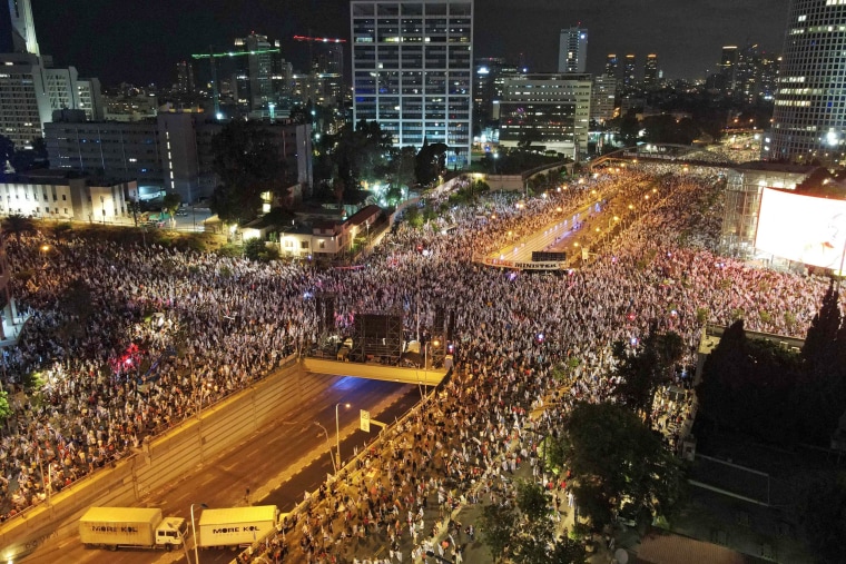 Protesters march against the Israeli government's judicial overhaul plan in Tel Aviv on July 29, 2023. 