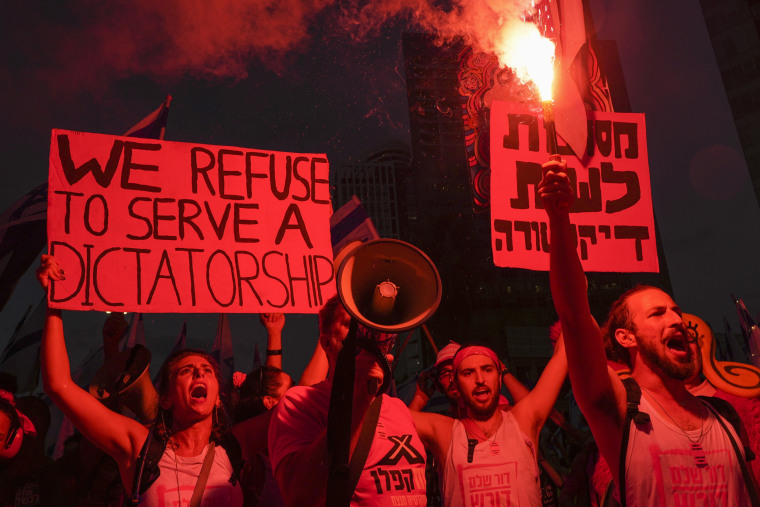 Israelis protest plans by Prime Minister Benjamin Netanyahu's government to overhaul the judicial system in Tel Aviv, Israel, Saturday, July 29, 2023. 