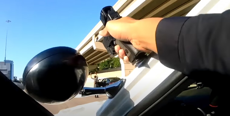 An Arkansas family is held at gunpoint by police who falsely believed  their car was stolen.