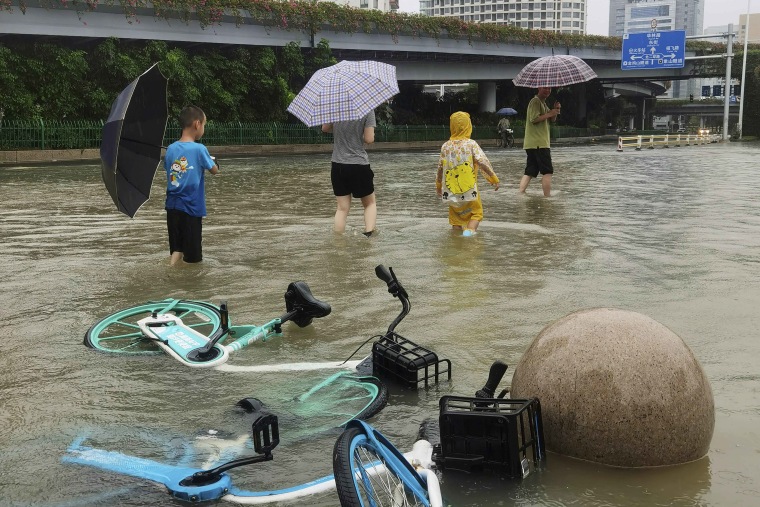 Typhoon Doksuri weakened into a tropical storm late night Friday after bringing heavy rain and winds that left more than a million people without power in southern China. (Chinatopix via AP)