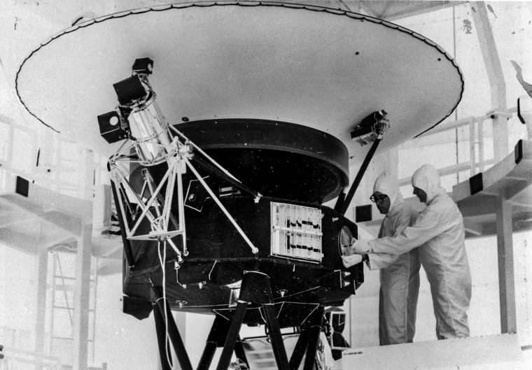 Image: The "Sounds of Earth" record is mounted on the Voyager 2 spacecraft in the Safe-1 Building at the Kennedy Space Center, Fla., prior to encapsulation in the protective shroud on Aug. 4, 1977.