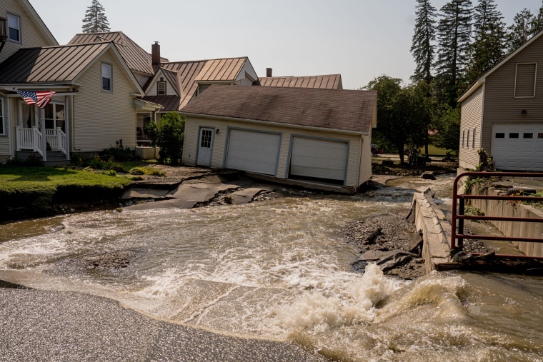 Homes in Barre, Vt., inundated with flash flooding on July 11, 2023.