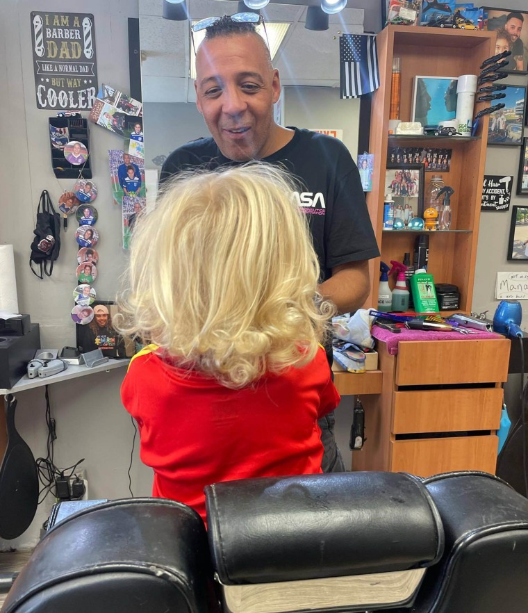 New Jersey Barber Billy Dinnerstein, prepping one of his lucky clients for a haircut.