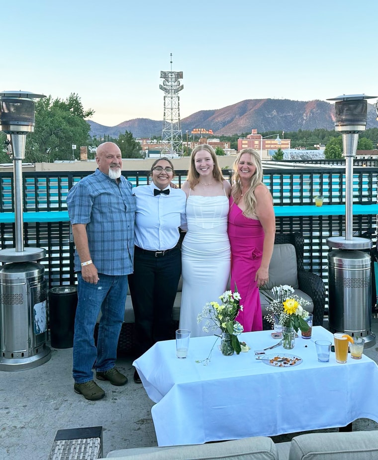 Gwendlyn Brown at her wedding with Beatriz Quieroz and her mom, Christine Brown, and her mom's fiancé, David Woolley.