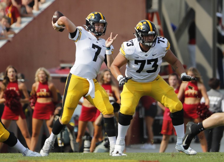 Quarterback Spencer Petras and Cody Ince of the Iowa Hawkeyes 