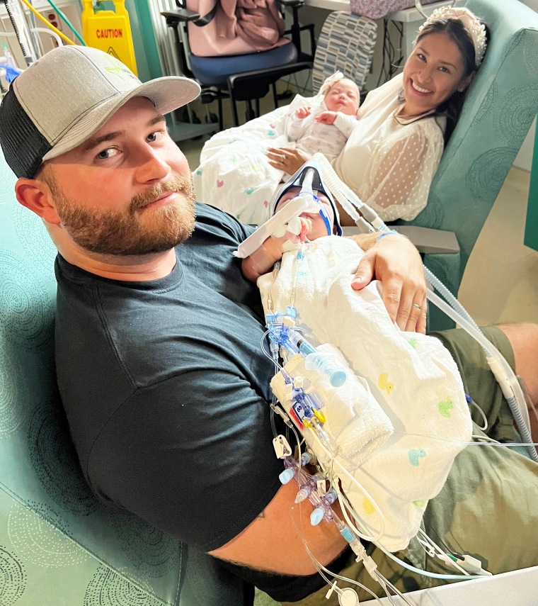 Holding their babies separately for the first time felt exciting for Jesse and Sandy Fuller.