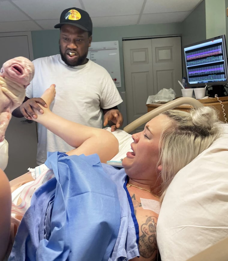 THAT'S how babies get born? Dad is shocked when he sees the business end of birth with baby No. 4.