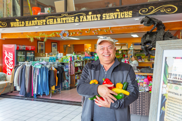 Glen Curado in front of World Harvest.