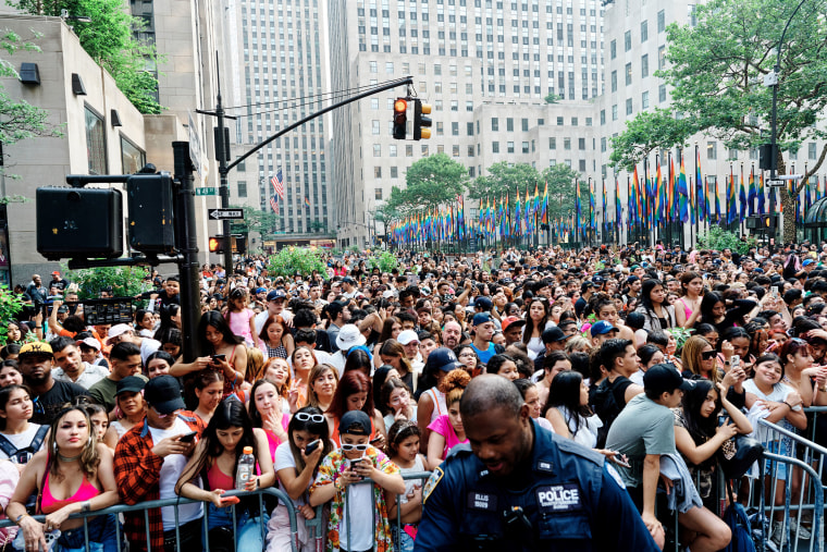 A large crowd of people watch Karol G perform on 30 rock plaza for the TODAY show. 