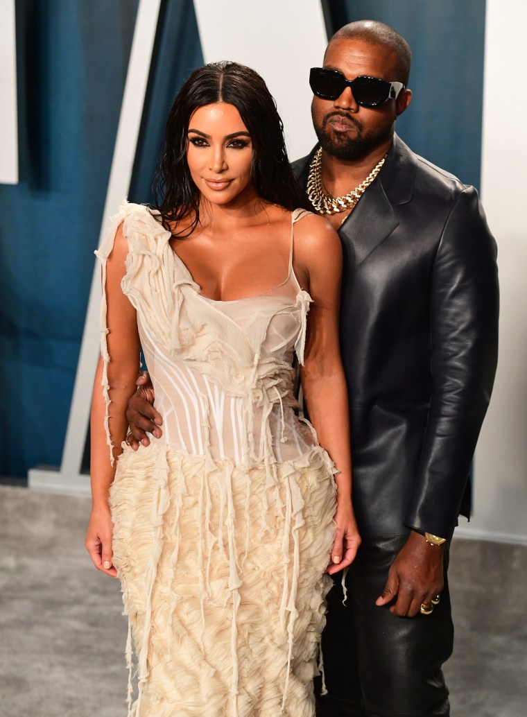 Kim Kardashian and Kanye West at the Vanity Fair Oscar Party in Los Angeles, CA.
