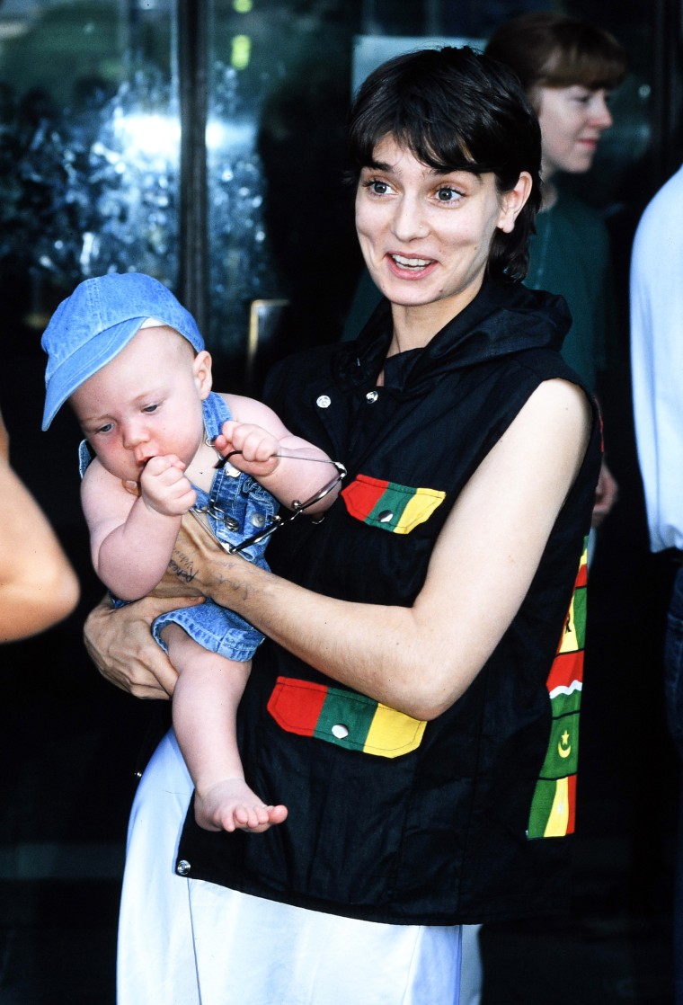 Sinéad O'Connor and her child 1995.