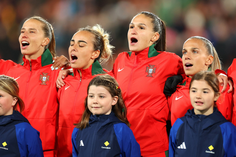 HAMILTON, NEW ZEALAND - JULY 27: Portugal players line up for the national anthem prior to the FIFA Women's World Cup Australia & New Zealand 2023 Group E match between Portugal and Vietnam at Waikato Stadium on July 27, 2023 in Hamilton, New Zealand.