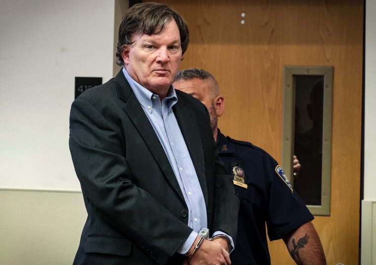 Accused Gilgo Beach killer Rex A. Heuermann appears before Judge Timothy P. Mazzei in Suffolk County Court  in Riverhead, N.Y., on Aug. 1, 2023.