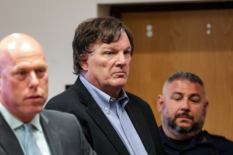 Accused Gilgo Beach killer Rex A. Heuermann appears before Judge Timothy P. Mazzei in Suffolk County Court in Riverhead, N.Y., on Aug. 1, 2023.