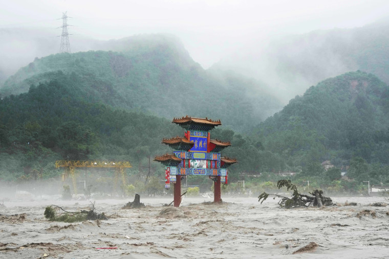 Chinese state media report some have died and others are missing amid flooding in the mountains surrounding the capital Beijing. 