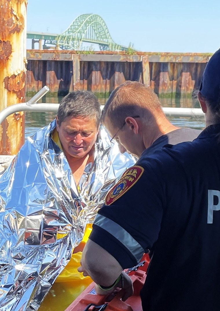 Dan Ho after he was pulled out of the water on Monday morning.