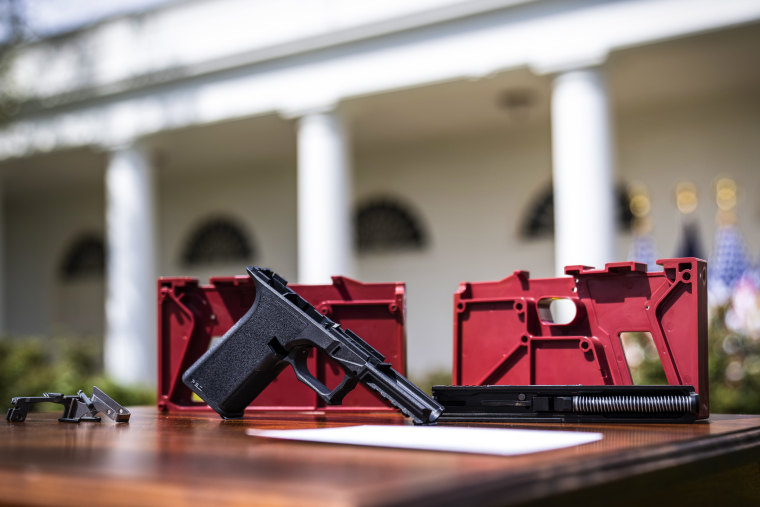 Image: A ghost gun is displayed before the start of an event about gun violence in the Rose Garden of the White House on April 11, 2022.