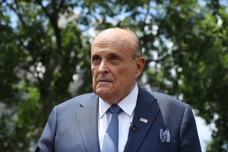 Former New York City Mayor Rudy Giuliani talks to journalists outside the White House on July 1, 2020.