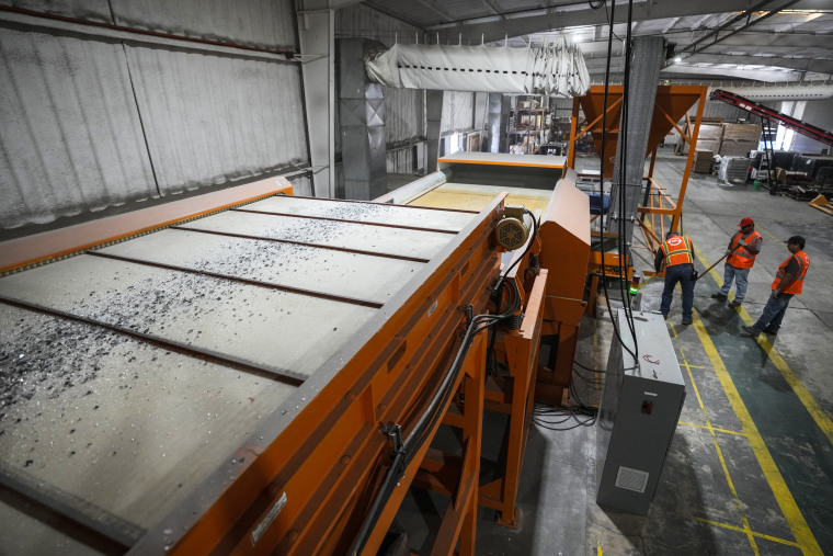 Image: A sorting machine breaks down solar panels at We Recycle Solar on June 6, 2023, in Yuma, Ariz. 