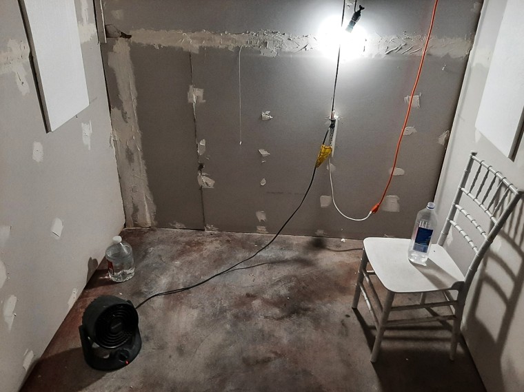 The interior of a cinder block cell where Negasi Zuberi allegedly held a woman captive at his home in Klamath Falls, Ore.