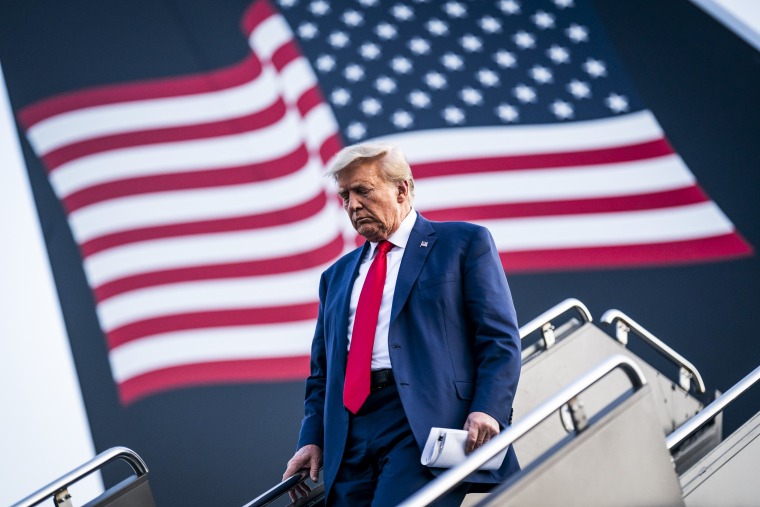 Former President Donald Trump disembarks his plane in Newark, N.J., on June 13, 2023.