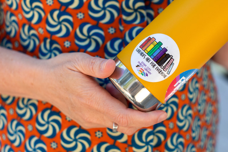 Emily Drabinski, president of the American Library Association, has an Iowa city public libraries Pride sticker, reading “Libraries are for Everyone” on her water bottle.