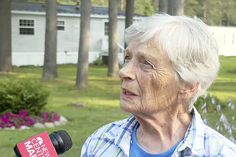 Marjorie Perkins speaks to a reporter Wednesday, Aug. 2, 2023, at her home in Brunswick, Maine. Perkins, 87, was left bruised after police said a teenager broke into her home and attacked her. She fought off the intruder and gave him food before he fled.