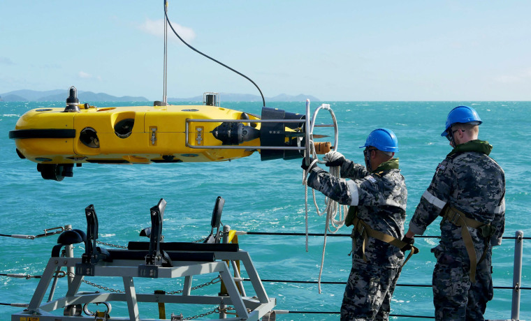 Human remains have been found at the site where an Australian military helicopter plunged into the sea off the country's northeast coast, authorities said on August 3. 