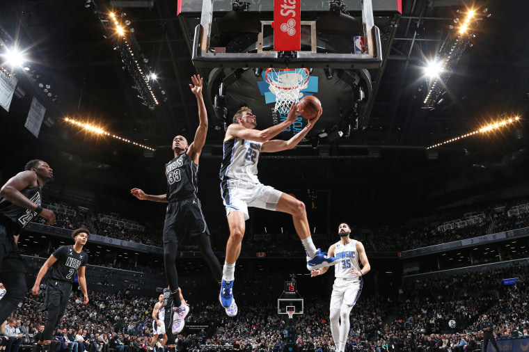 Franz Wagner of the Orlando Magic drives to the basket during the game against the Brooklyn Nets