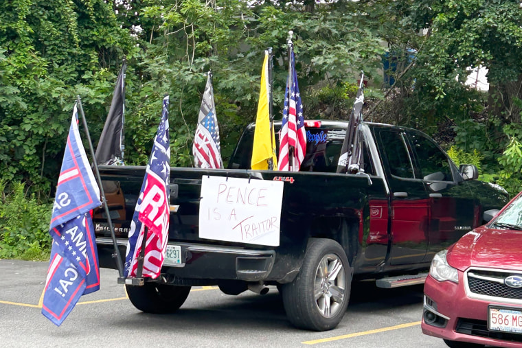 A pickup truck with Trump flags and a sign that reads, "Pence is a Traitor" on it, outside American Legion Hall Post 27 in Londonderry, N.H., on Aug. 4, 2023.