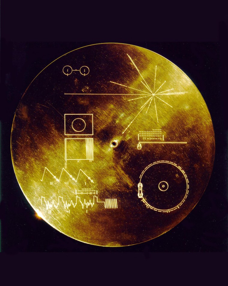 (FILES) This 1977 NASA file image obtained 29 August 2002 shows a gold aluminum cover that was designed to protect the Voyager 1 and 2 "Sounds of Earth" gold-plated records from micrometeorite bombardment, but also serves a double purpose in providing the finder a key to playing the record. NASA's Voyager 2 probe has signaled it is in "good health" after mission control mistakenly cut contact for several days, the space agency said in its latest update. Launched in 1977 as a beacon from humanity to the wider Universe, it is currently more than 12.3 billion miles (19.9 billion kilometers) from our planet, exploring interstellar space along with its twin, Voyager 1. A series of planned commands sent to Voyager 2 on July 21, 2023, "inadvertently caused the antenna to point two degrees away from Earth," NASA's Jet Propulsion Laboratory (JPL) said in a recent update.