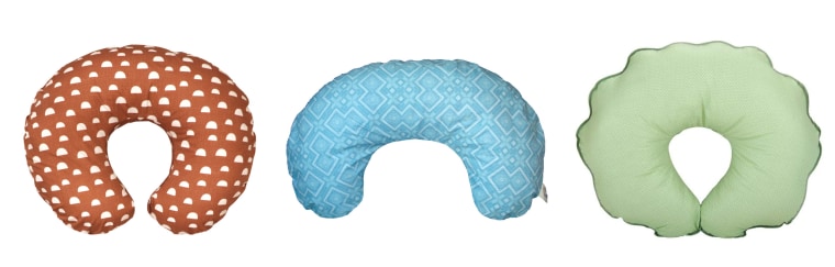 Image: The Boppy Original Support Nursing Pillow, The Leachco, the Boston Billow Bedford Nursing Pillow, and the Leachco Cuddle-U Nursing Pillow.