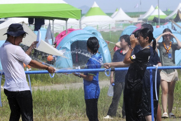 More than 100 people were treated for heat-related illnesses at the World Scout Jamboree being held in South Korea, which is having one of its hottest summers in years. 
