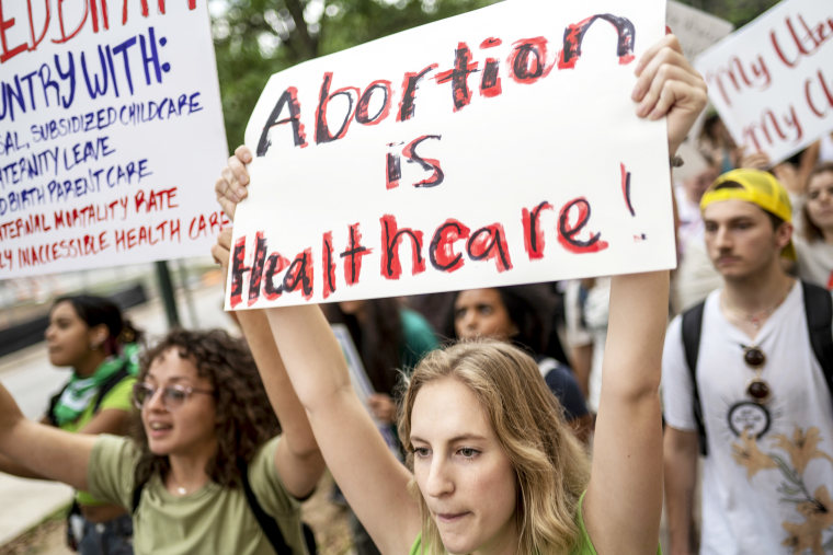 Demonstrators march towards the Texas Capitol building during a national walk out in support of abortion rights at the University of Texas in Austin, Texas, U.S., on Thursday, May 5, 2022. For decades the fight to end abortion in America has been waged over Roe v. Wade. With the Supreme Court poised to overturn the landmark decision that legalized a womans right to choose, the fight to stop abortion is going to become a fight about a pill. Photographer: Sergio Flores/Bloomberg via Getty Images