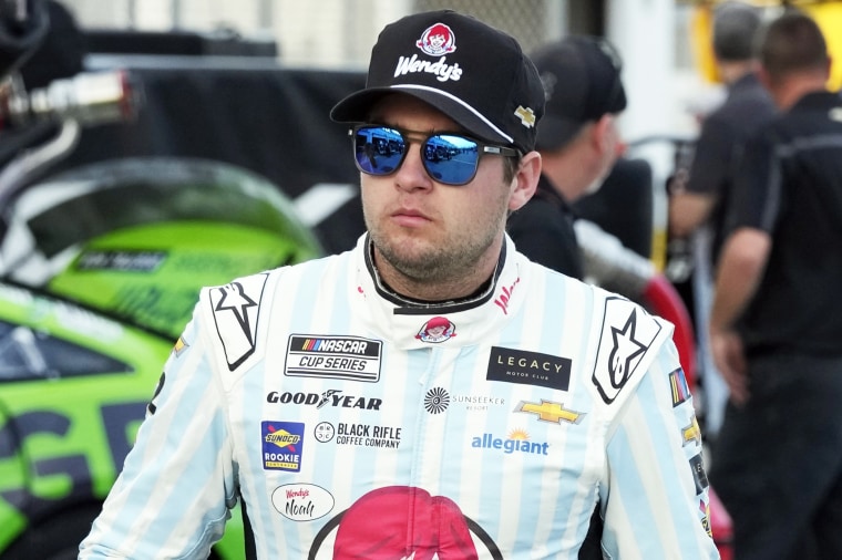 Noah Gragson walks to his garage during a practice session for the NASCAR Daytona 500 auto race